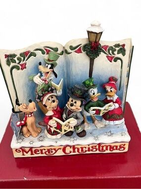 Jim Shore Disney Traditions Holiday Carolers Figurine with Red and Green Accents